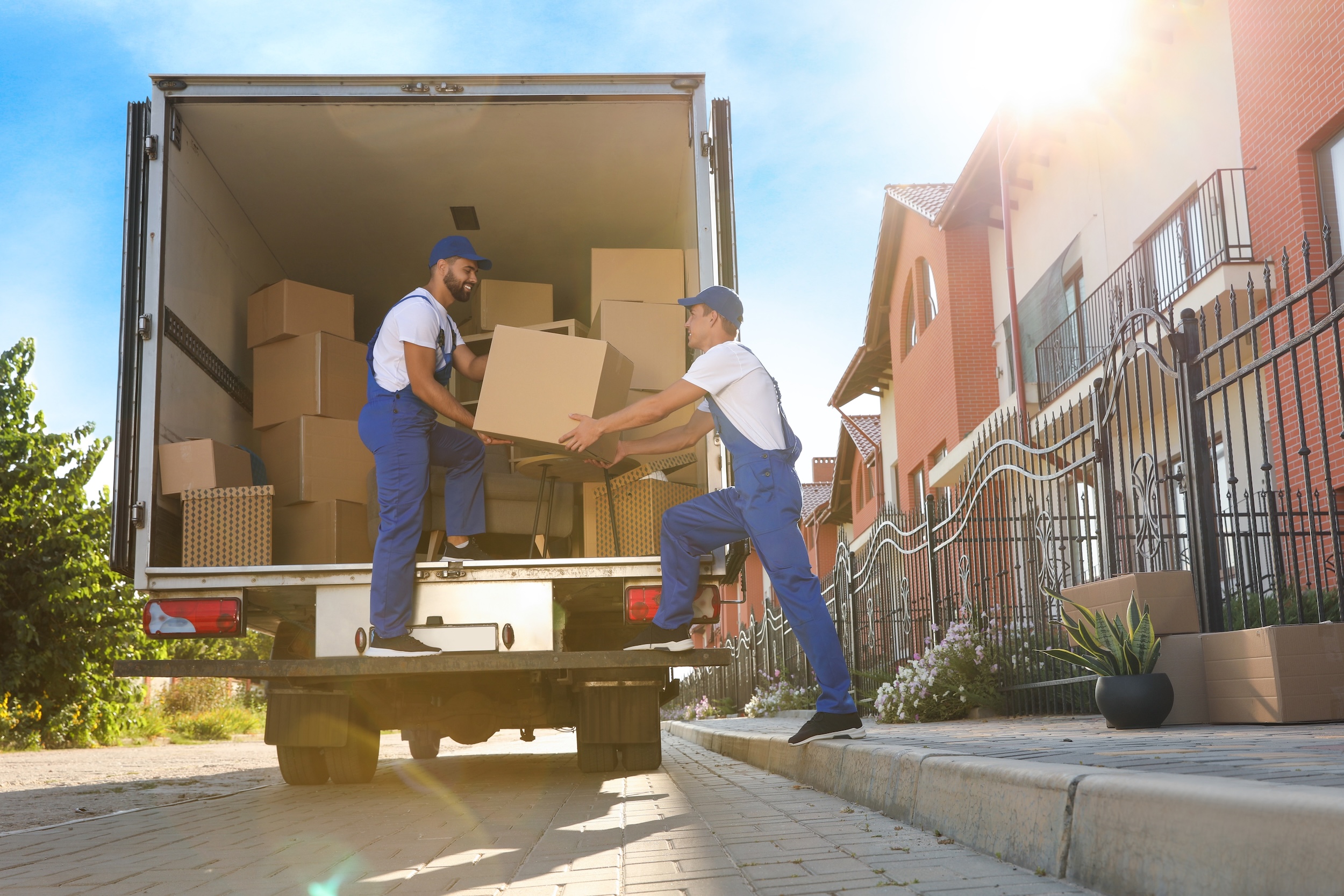 Workers,Unloading,Boxes,From,Van,Outdoors.,Moving,Service Box Truck Insurance Kentucky